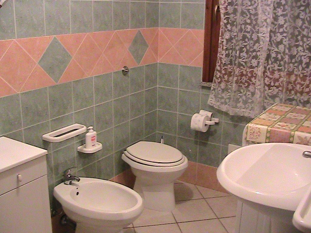 Casa Giovanna Porto Pino Zimmer foto