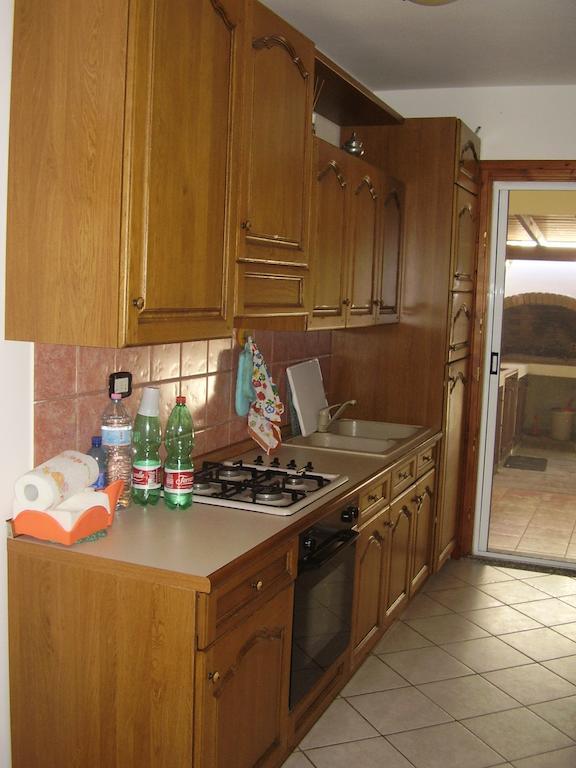 Casa Giovanna Porto Pino Zimmer foto