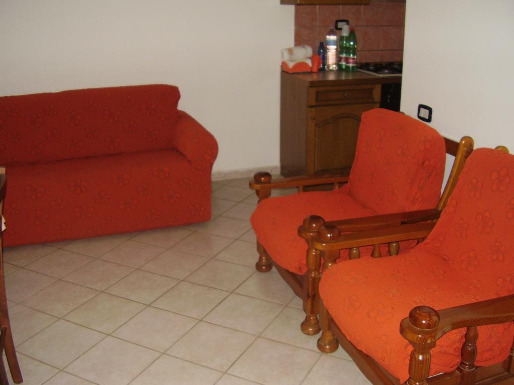 Casa Giovanna Porto Pino Zimmer foto