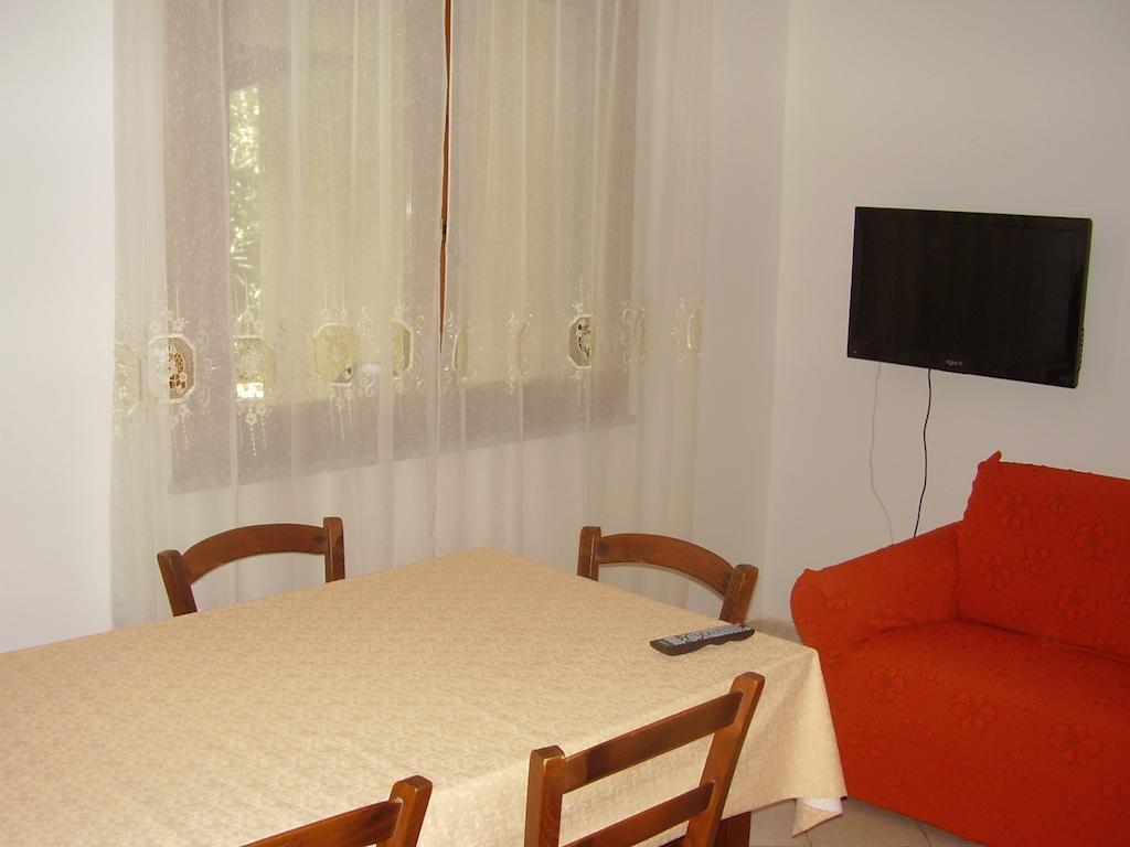 Casa Giovanna Porto Pino Zimmer foto